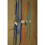 A quantity of fibre glass archery bows