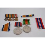 A Great War miniature medal group and two Second World War campaign medals etc