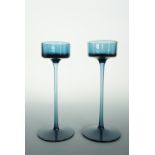 A pair of hollow-stemmed Brancaster candlesticks in blue, as designed for Wedgwood Glass by Ronald