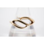 A 9 ct gold triple-scroll finger ring, N, 1.9 g