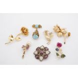 A group of largely gilt metal costume jewellery including a 1960s German Grossé flamboyant