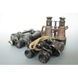 Three sets of British Great War and Second World War military binoculars