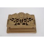 An Art Nouveau cast brass postage stamps box