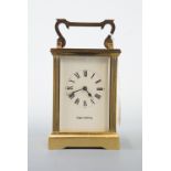 A Mappin and Webb brass carriage clock, 13 cm high