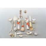 Tea infusers, two sugar casters and cutlery