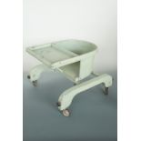 A mid 20th Century infant's feeding chair / walker