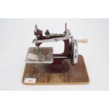 A vintage miniature sewing machine