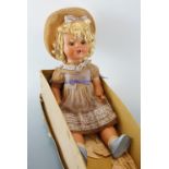 A vintage doll, 58 cm high