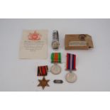 A Second World War RAF campaign medal group including an identity bracelet and Rolco ( Rolex brand )