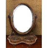 A Victorian mahogany swivel toilet mirror, 77 cm high