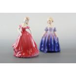 Royal Doulton figurine, Marie, HF 1370, together with a Coalport figurine, Amy, tallest 13 cm