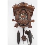 An antique cuckoo clock, 52 cm