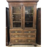 An 18th Century and later carved-oak cabinet-on-chest, 130 cm x 205 cm
