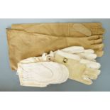 British army mosquito gloves, snow mittens and a pair of reproduction US army hide gloves