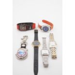 An Orion dual-time quartz wristwatch together with Rotary, Times and Seiko quartz-analogue