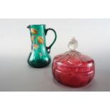 A ruby glass lidded box together with a hand enamelled jug