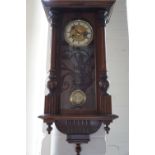 A late 19th / early 20th Century Vienna type wall clock, 74 cm high