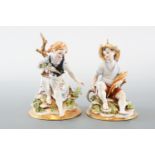 A pair of Capo-De-Monte figurines, Boy and Girl 12 cm high