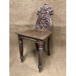 A Victorian mahogany hall chair