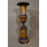 A turned hard-wood floor-standing urn / jardiniere, contemporary, ex-Chapman's, 75 cm