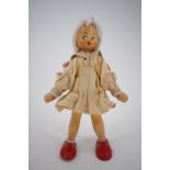 A small articulated wooden doll, circa 1950s, 18 cm