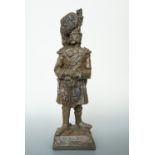 A cold-cast bronze sculpture of a Crimean War Black Watch soldier by Olde Garth Castings, 29 cm