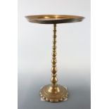 A brass occasional table, 34 cm x 50 cm high