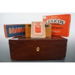 A treen money box and one other box, together with a vintage game of Lexicon, draughts and playing