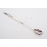 A 1920s "The Tom-Tom Man" Green Label Chutney pickle fork, 28 cm