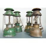 Four 1940s Bialladin lamps