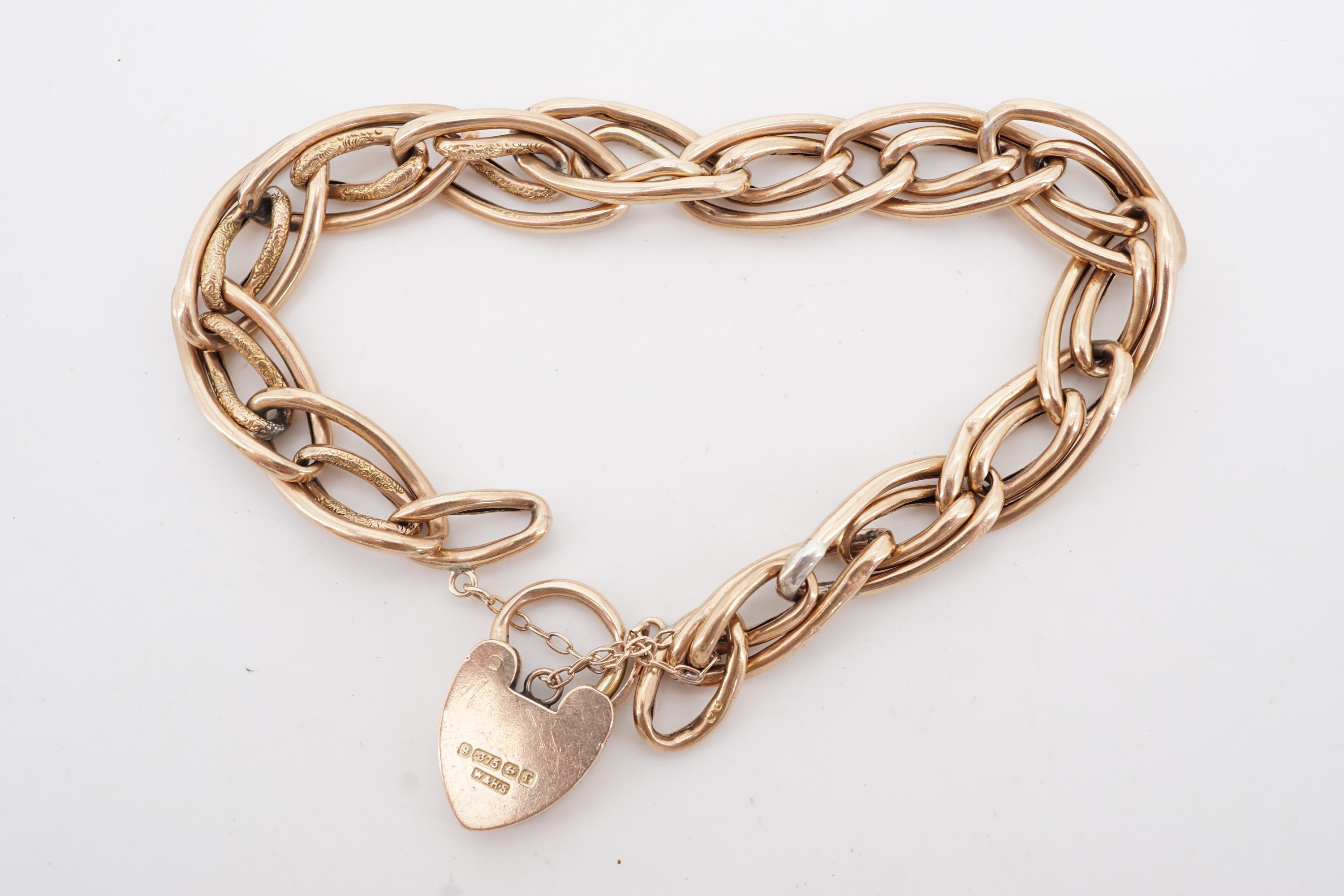 A Victorian yellow metal compound curb link bracelet with 9 ct gold padlock clasp, 14 g - Image 2 of 2