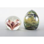 A Mdina paperweight and one other