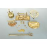 Brass ware including a fox letter rack, telescopic toasting fork, trivet, miniature brass