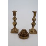 A pair of diminutive Victorian brass candlesticks together with a set of brass Imperial weights, 2