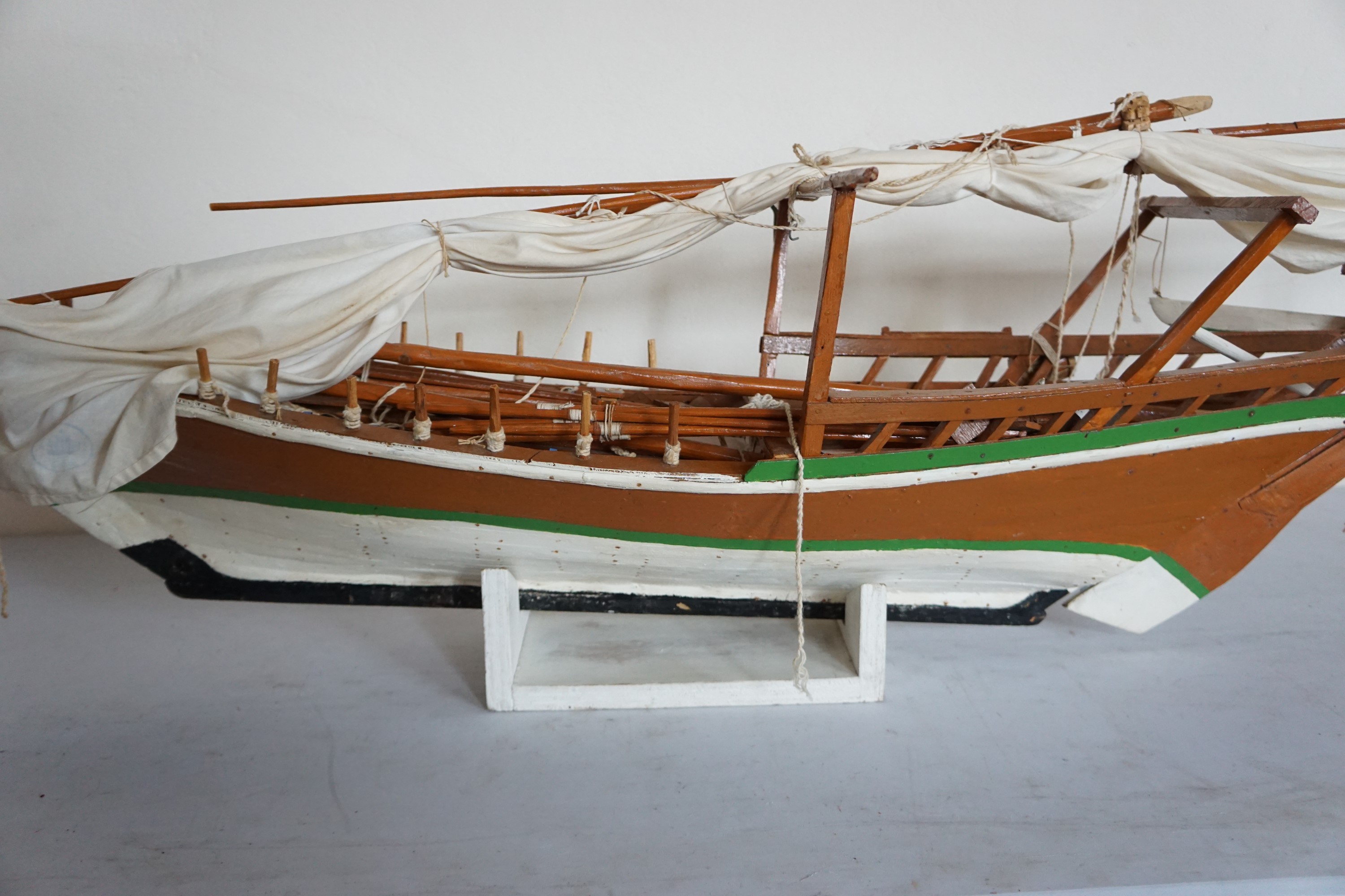 A hand-built large scale model of an Arab dhow, 153 cm