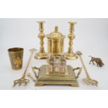 Brass ware including a Victorian tobacco jar with lead weight, an Indian beaker, small cast buffalo,