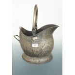 An anodised copper coal helmet