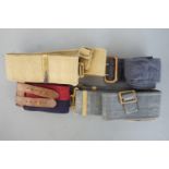 Two Pattern 1937 webbing belts, a British army stable belt and an RAF other airman's tunic belt