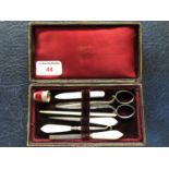 A Victorian leather cased manicure/sewing set