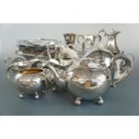 A large quantity of electroplate including a three piece tea set, baskets, teapot, trophy etc.