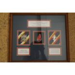 A framed presentation Royal Scots Dragoon Guards insignia group