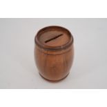 A treen barrel-form money box, late 19th Century, 8.5 cm