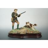 A boxed Border Fine Arts early Ray Ayres study of man and gun dog, No 112 "Dogging 'em up"