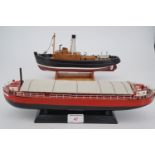 A wooden scale model of the Leeds & Liverpool canal longboat / barge"Ambush", originally built by