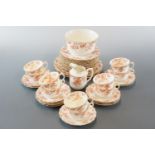 A Victorian tea set with blossom decoration