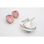 A pair of Norwegian enamelled white metal clip earrings, each of concave oval form, pink basse