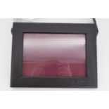An Aspinal of London "Black Rock" hand-made leather photograph frame, boxed as-new, 23 cm x 17 cm