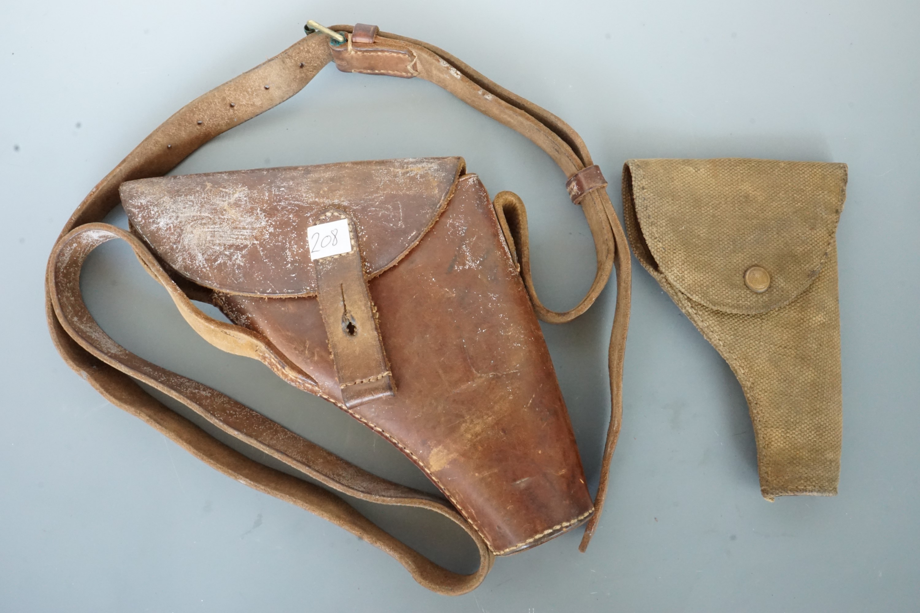 A British army flare pistol holster and one other holster