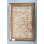 An early Victorian needlework alphabet sampler, being the work of Margaret Gardes in 1843, in