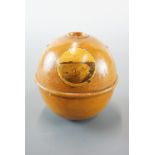 A Mauchline ware West End Sands Morecambe String box, 9 cm high